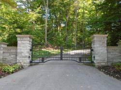 Another black steel gate with keypad and custom design
