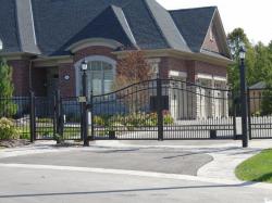 Steel gate with matching door gate and controls