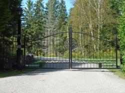 Black Steel gate with camera, and controls with light