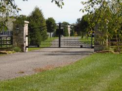 Black gate with custom front plate for logo or street number
