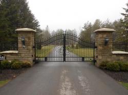 Stone Pillars and Custom Gate in Aurora.