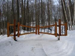 Wood and Iron Automatic Driveway Security Gate in Toronto.